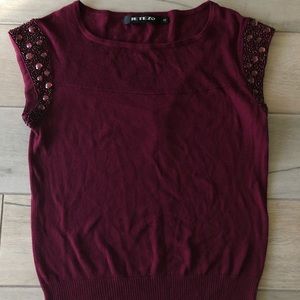 Maroon knit top with beaded sleeve